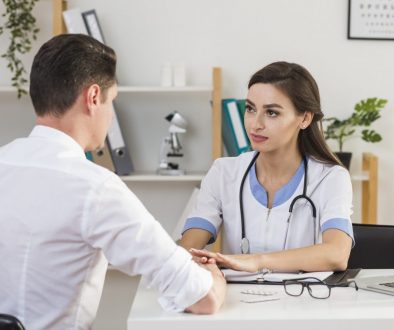 back-view-patient-talking-with-female-doctor